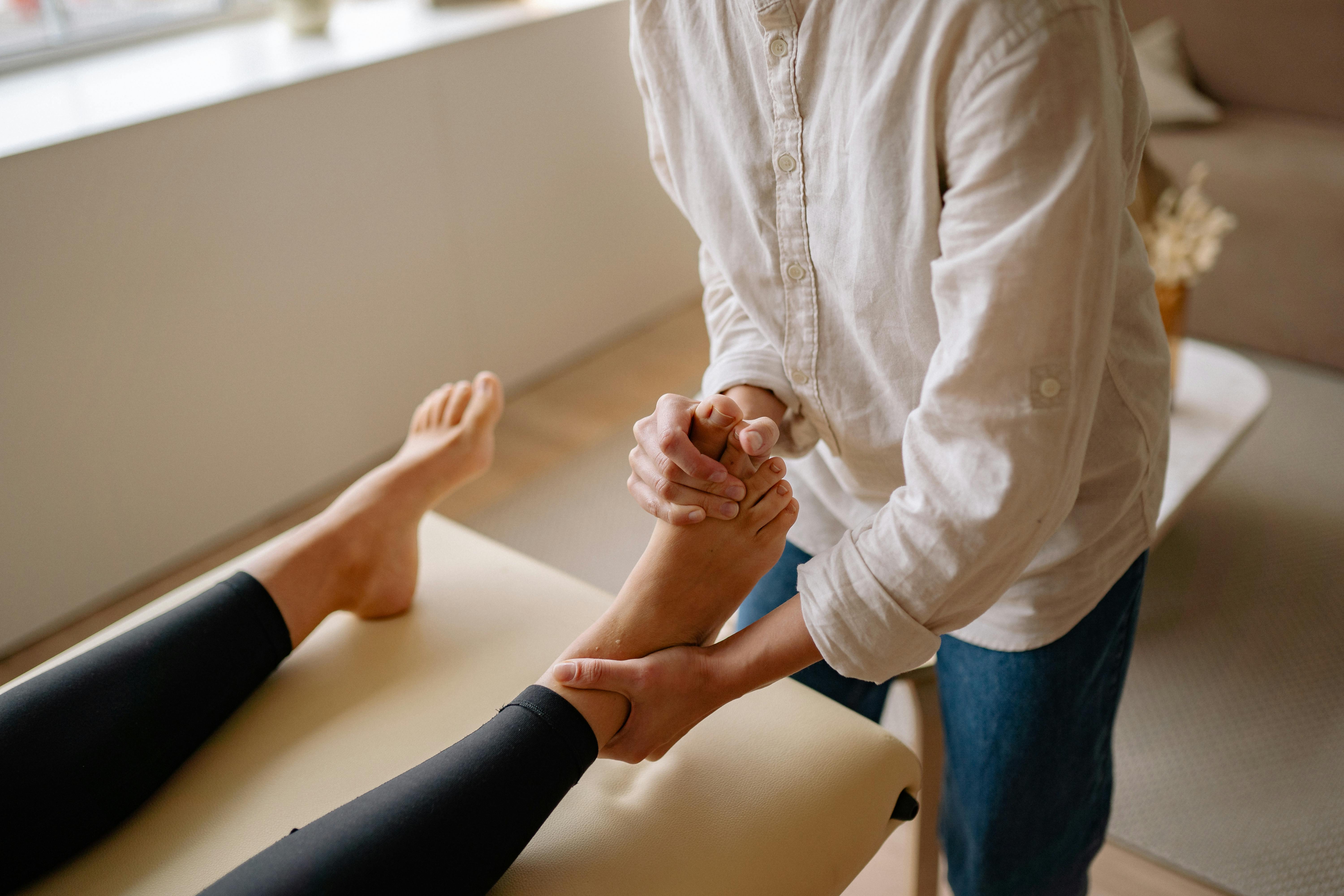 Physiotherapist working with patient
